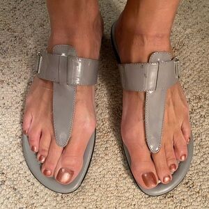 Flat slip on sandal. Has a stretch strap for comfort fit
